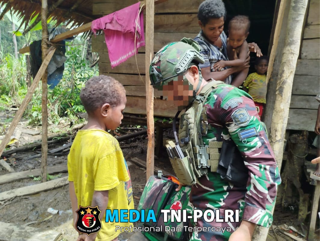 Satgas Yonif 6 Marinir Koops Habema Laksanakan Patroli Dengan Kunjungi dan Menyapa Warga di Kampung Kuari Papua