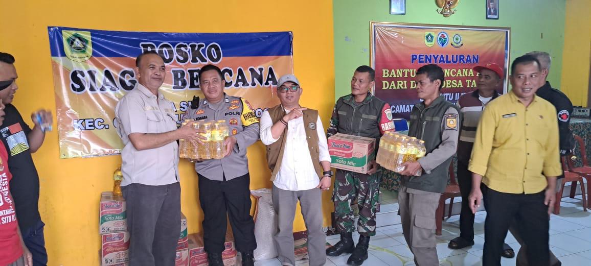 Polsek Ciampea Bersama Instansi Terkait Bantu Giat Penyaluran Bantuan Warga untuk Korban Bencana Alam Desa Ciggidung Udik Kecamatan Cibungbulang