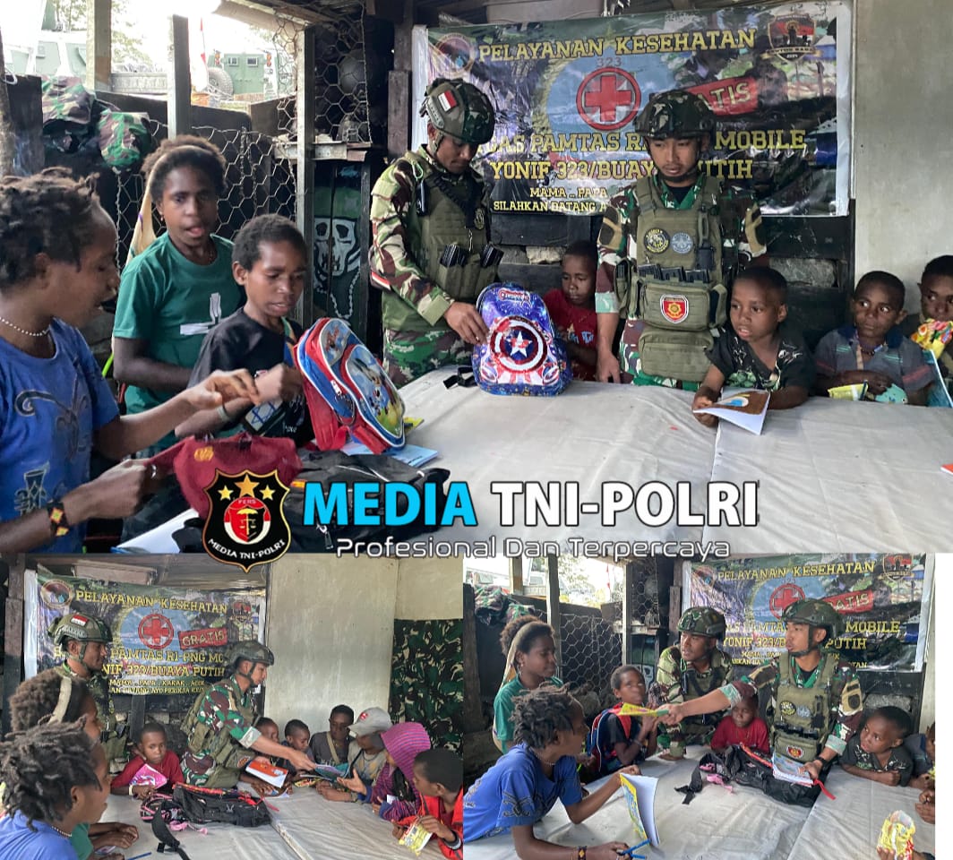 Peduli Kebutuhan Anak Sekolah, Satgas Yonif 323 Buaya Putih Bagikan Tas Sekolah dan Alat Tulis