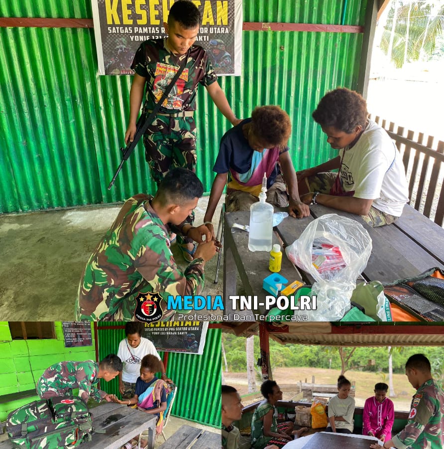 Dedikasi Satgas Yonif 131/Brs Berikan Pengobatan Gratis Kepada Masyarakat Di Perbatasan RI-PNG
