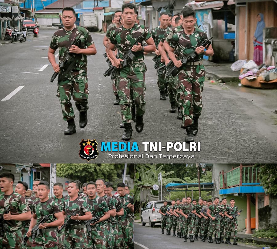 Semangat Berkobar Prajurit Satgas Pamtas Yonarmed 11 Kostrad Lari Bersenjata di Perbatasan