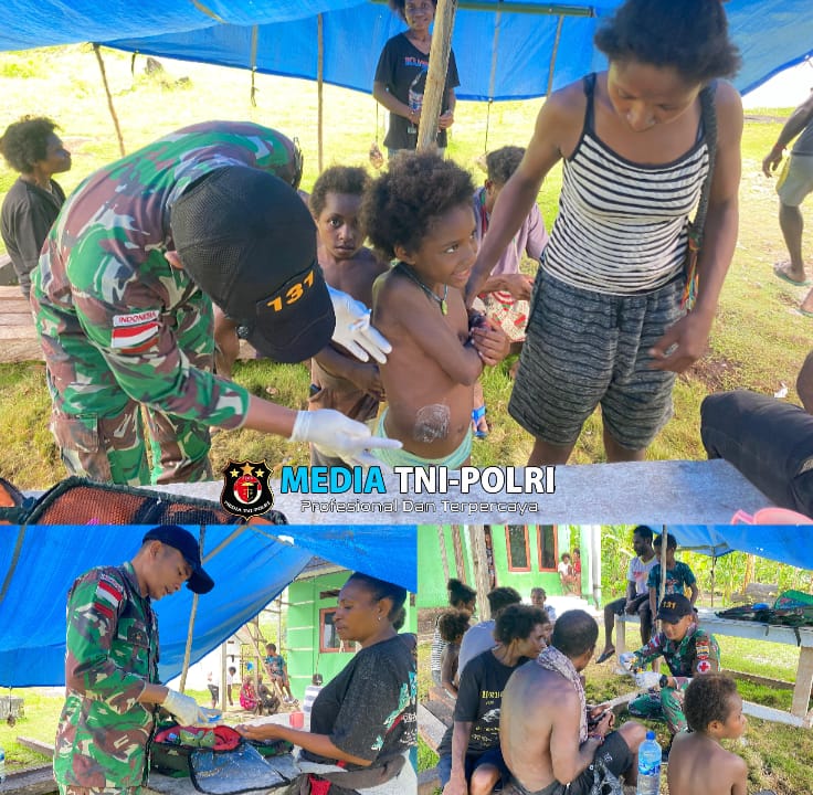 Selalu Perhatikan Kesehatan Masyarakat Papua, Satgas Yonif 131/Brajasakti Beri Pelayanan Kesehatan Gratis di Distrik Muara Tami