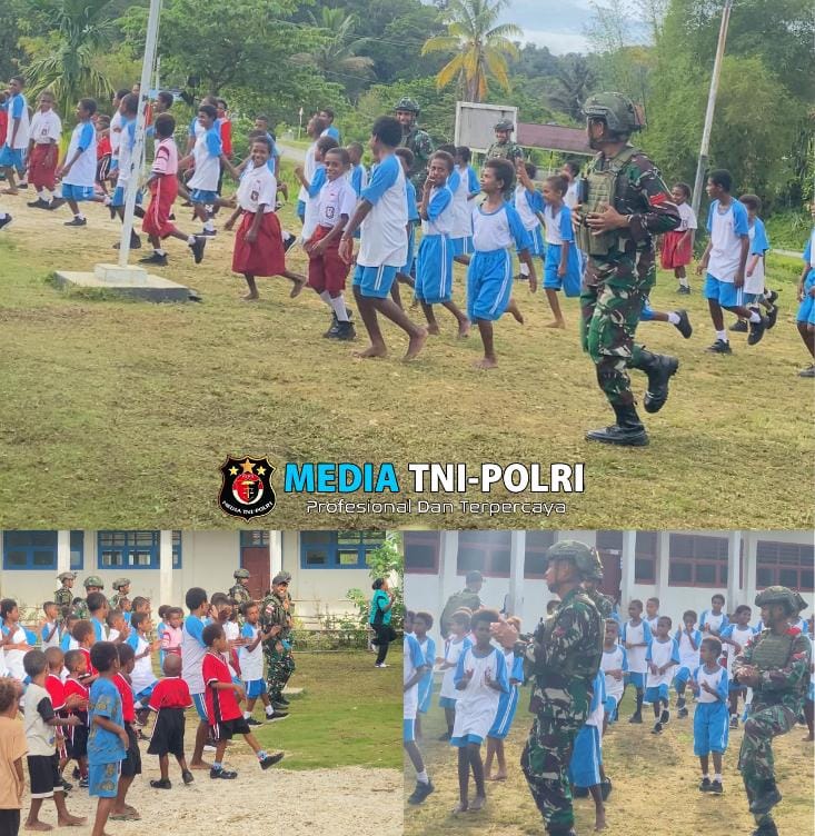Bangkitkan Semangat Sebelum Belajar, Satgas Yonif 762/VYS Ajak Para Murid Lakukan Senam Pagi