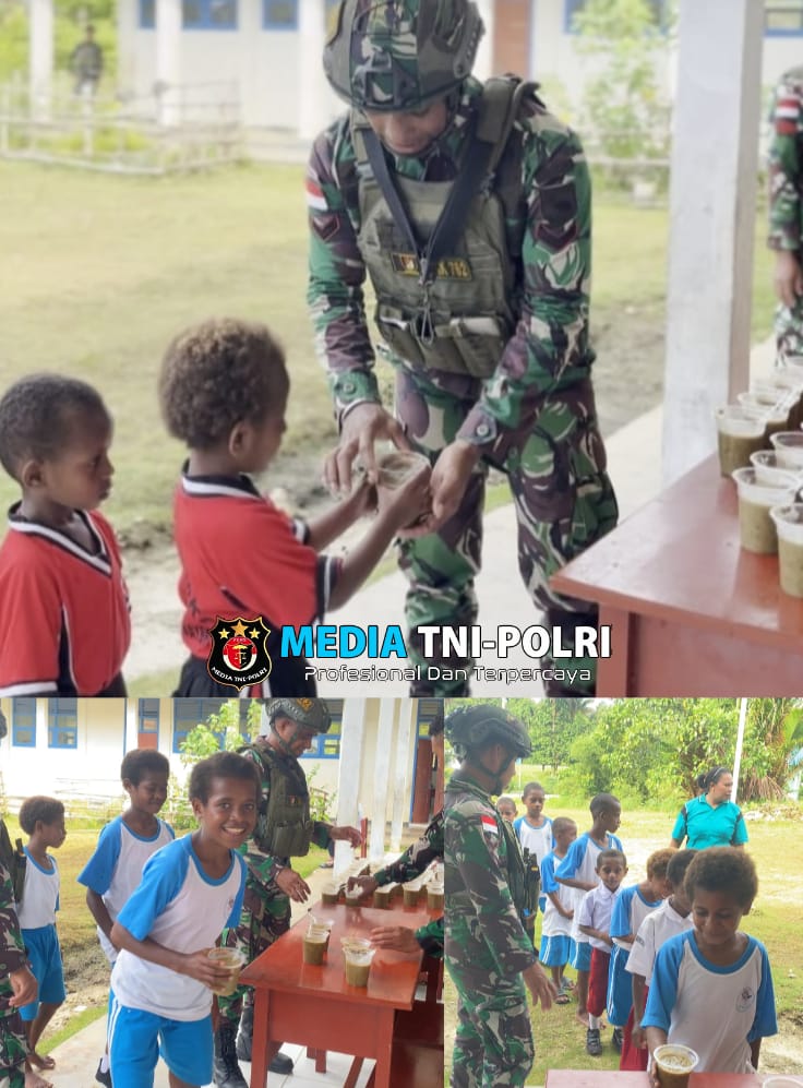Hadirkan Senyuman, Satgas Yonif 762/VYS Bagikan Bubur Kacang Hijau Kepada Murid SD YPPK Yamko Konja