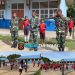 Sehat dan Disiplin, Satgas Yonif 762/VYS Olahraga Bersama dan Melatihkan PBB murid SD Inpres 13 Kumurkek