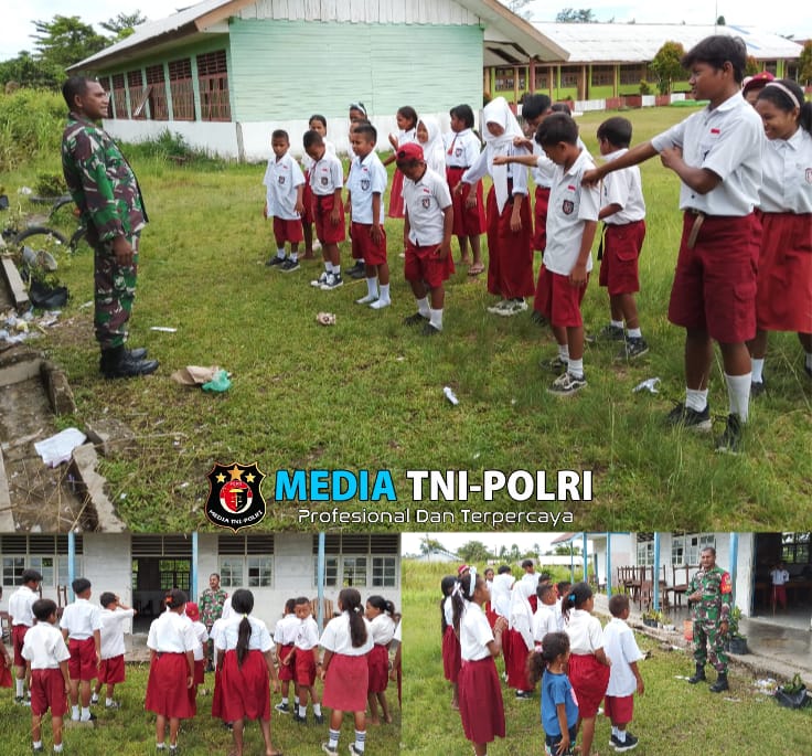 Kegiatan Pos Ramil 1705-03/Kwatisore Memberikan Materi PBB (Peraturan Baris Berbaris) Kepada Pelajar Sekolah Dasar Inpres Wami Jaya.