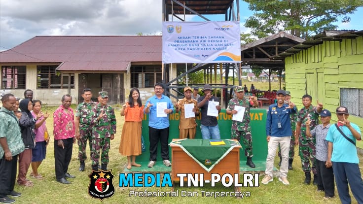 Danramil Nabire Hadiri Serah Terima Sarana Air Bersih di Kampung Bumi Mulia