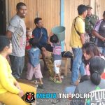 Babinsa Koramil 1705-04/Moanemani Melaksanakan Kegiatan Komunikasi Sosial (KOMSOS) di Pasar Lama Desa Ikebo