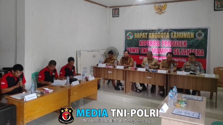 Kanit Binmas Polsek Kuala Behe Hadiri Rapat Anggota Tahunan Koperasi Ene’ Mampui Sejahtera Mitra PT.PAS