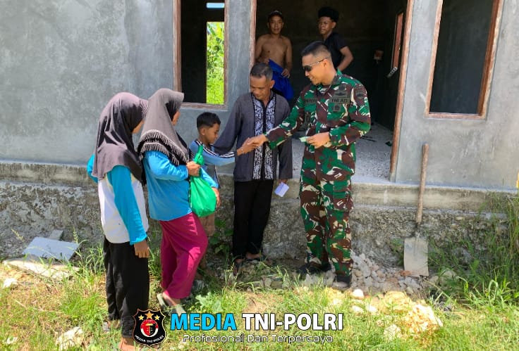 Berbagi Berkah Ramadhan, Satgas Yonif 131/BRS Bagikan Sembako Kepada Masyarakat di Kampung Wonorejo Papua