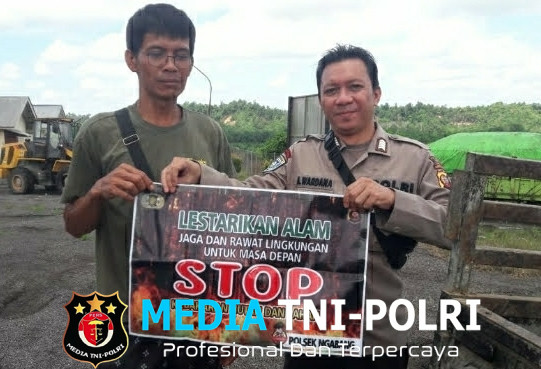 Antisipasi Kebakaran Hutan dan Lahan, Bhabinkamtibmas Polsek Ngabang Imbau Warga Untuk Bersama Jaga Hutan