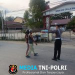 Aipda Hengki Laksanakan Pengaturan Arus Lalu Lintas Untuk Ciptakan Situasi Aman Lancar