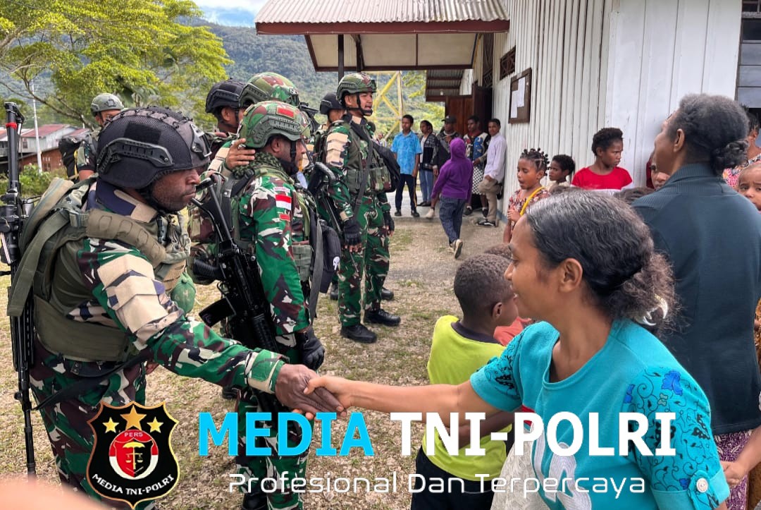 Berbagi untuk Negeri, Satgas Yonif 751/VJS Pos Okpol Hadirkan Kebahagiaan di Kampung Kutdol