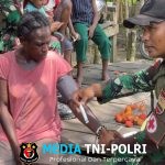 Pelayanan Kesehatan Gratis, Satgas Yonif 131/Brajasakti Selalu Bantu Kesulitan Masyarakat Perbatasan Papua