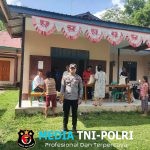 Kapolsek dan Bhabinkamtibmas Polsek Meranti Pantau Penyaluran Bantuan Pangan