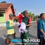 Sambut HUT RI ke-80, Koramil dan Forkopimcam Kemusu Bagikan Bendera Merah Putih Ke Masyarakat