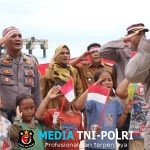 4 Jam Menembus Laut Demi Merah Putih, Kapolres Tanggamus Bersama Warga Kibarkan Bendera di Pulau Terluar Tabuan