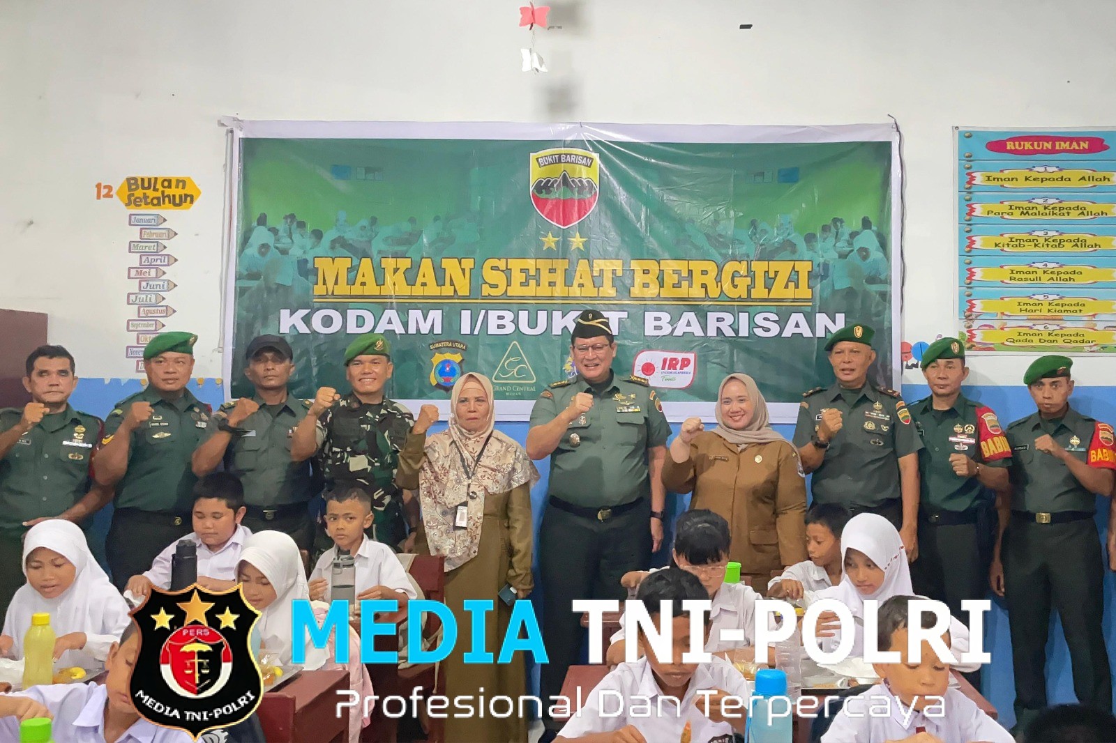 Kodam I/BB Bagikan 160 Paket Makan Sehat ke Siswa SD di Desa Tembung