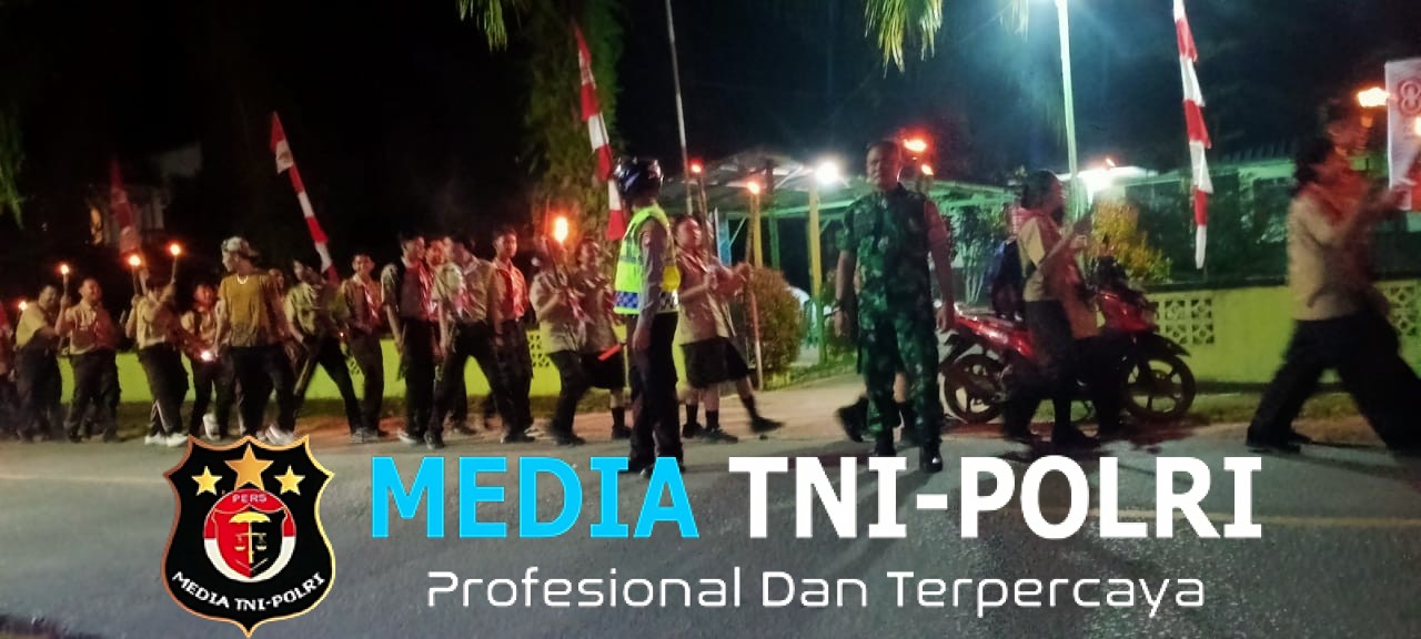 Personil Polsek Mempawah Hulu berikan Pengamanan dan Pengawalan Kegiatan Pawai Obor