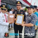 Camat Baamang Jadi Inspektur Upacara HUT RI yang ke-80 di SMPN 9 Baamang Hulu Sampit