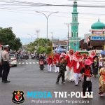 Sat Lantas Polres Tanggamus dan Polsek Kota Agung Amankan Karnaval Anak PAUD, TK dan SD HUT ke-80 RI