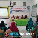 Babinsa Koramil 1015-10/Telaga Pulang Hadiri Pertemuan Lokakarya Mini Lintas Sektor UPTD Puskesmas Terawan