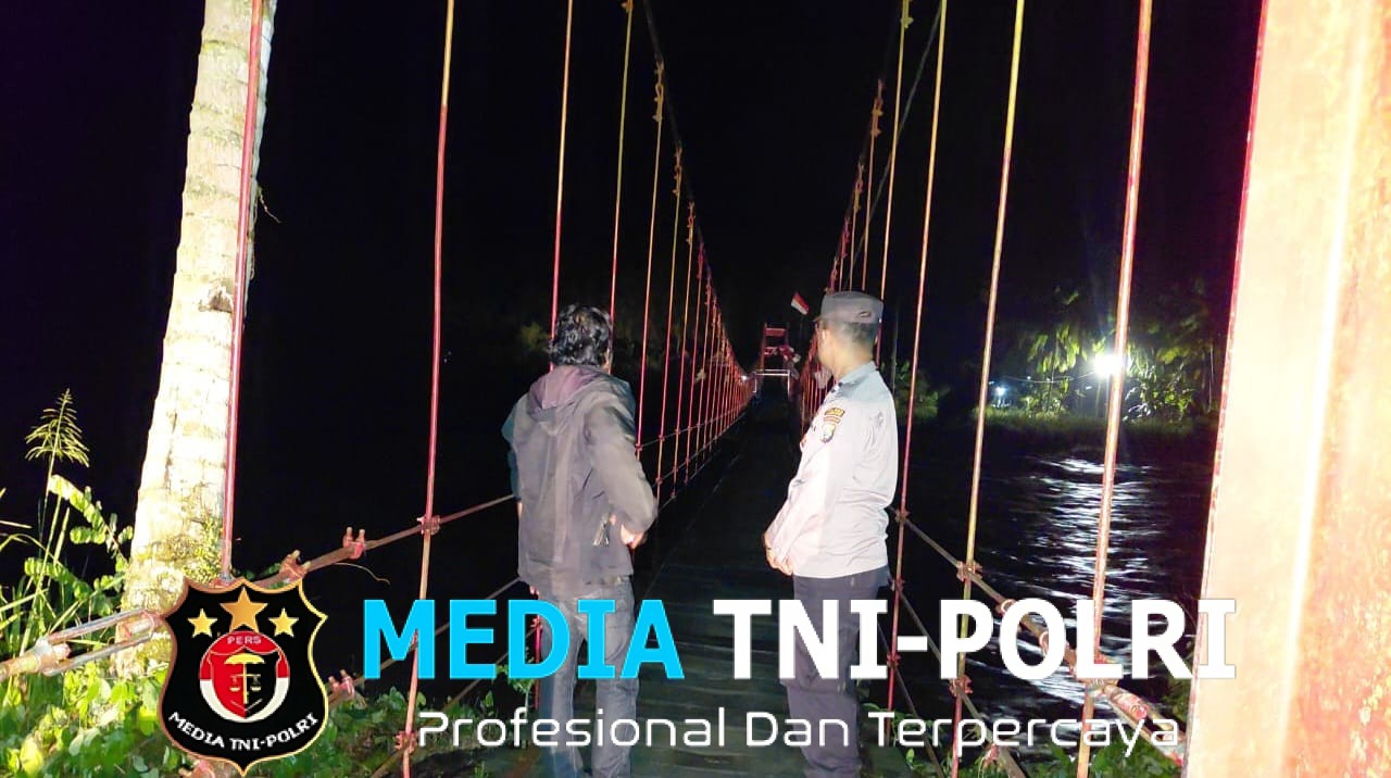 Antisipasi Banjir, Polsek Semaka Tinjau Debit Air Sungai Tulung Asahan