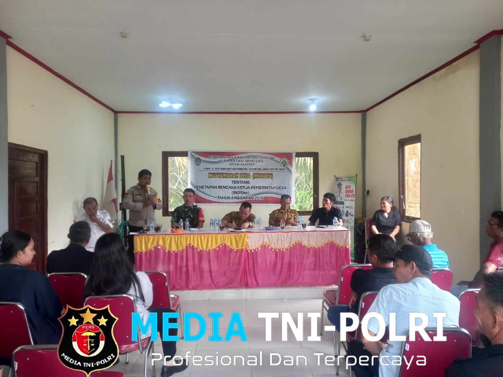 Kapolsek Menyuke Polri Siap Kawal Transparansi Pembangunan Desa Mamek