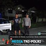 Dinginnya Malam Tak Surutkan Semangat Personel Polsek Air Besar Berpatroli Demi Keamanan Warga