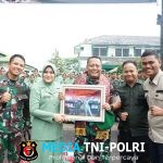 Tradisi Pedang Pora Iringi Lepas Sambut Dandim 0402/OKI-OI
