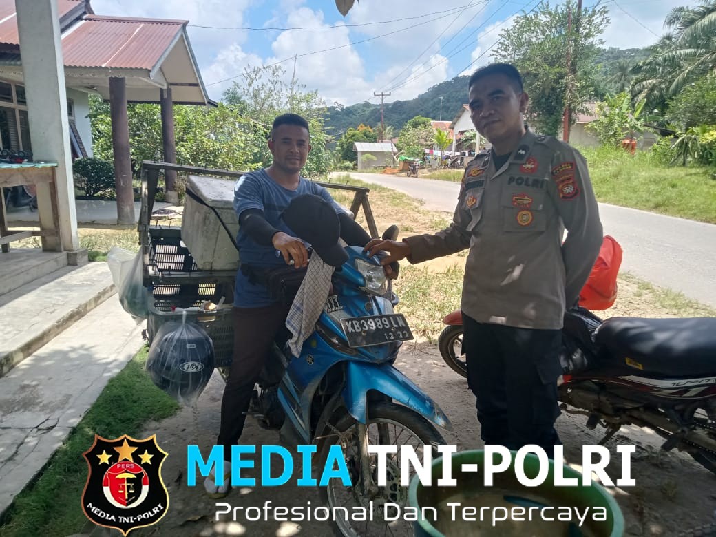 Dengan Senyum dan Sapaan, Kanit Binmas Bangun Keakraban dengan Warga