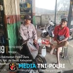 Polisi dan Warga Ngobrol Asik di Hari Minggu, Ciptakan Suasana Aman dan Akrab