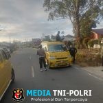Personel Polsek Parbuluan Berikan Teguran Kepada Supir Angkutan yang Mengangkut Penumpang di Atas Mobil