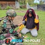 Satgas Yonif 521/DY Laksanakan Komsos di Distrik Walesi