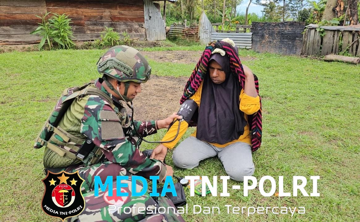 Satgas Yonif 521/DY Laksanakan Komsos di Distrik Walesi