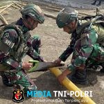 Karya Bhakti Satgas Yonif 521/DY Bersama Warga di Gereja Kobakma