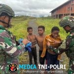 Pos Serambakon Satgas Yonif 751/VJS Bagikan Pakaian untuk Warga Kampung Wanbakon Senyum Anak-Anak Mengembang