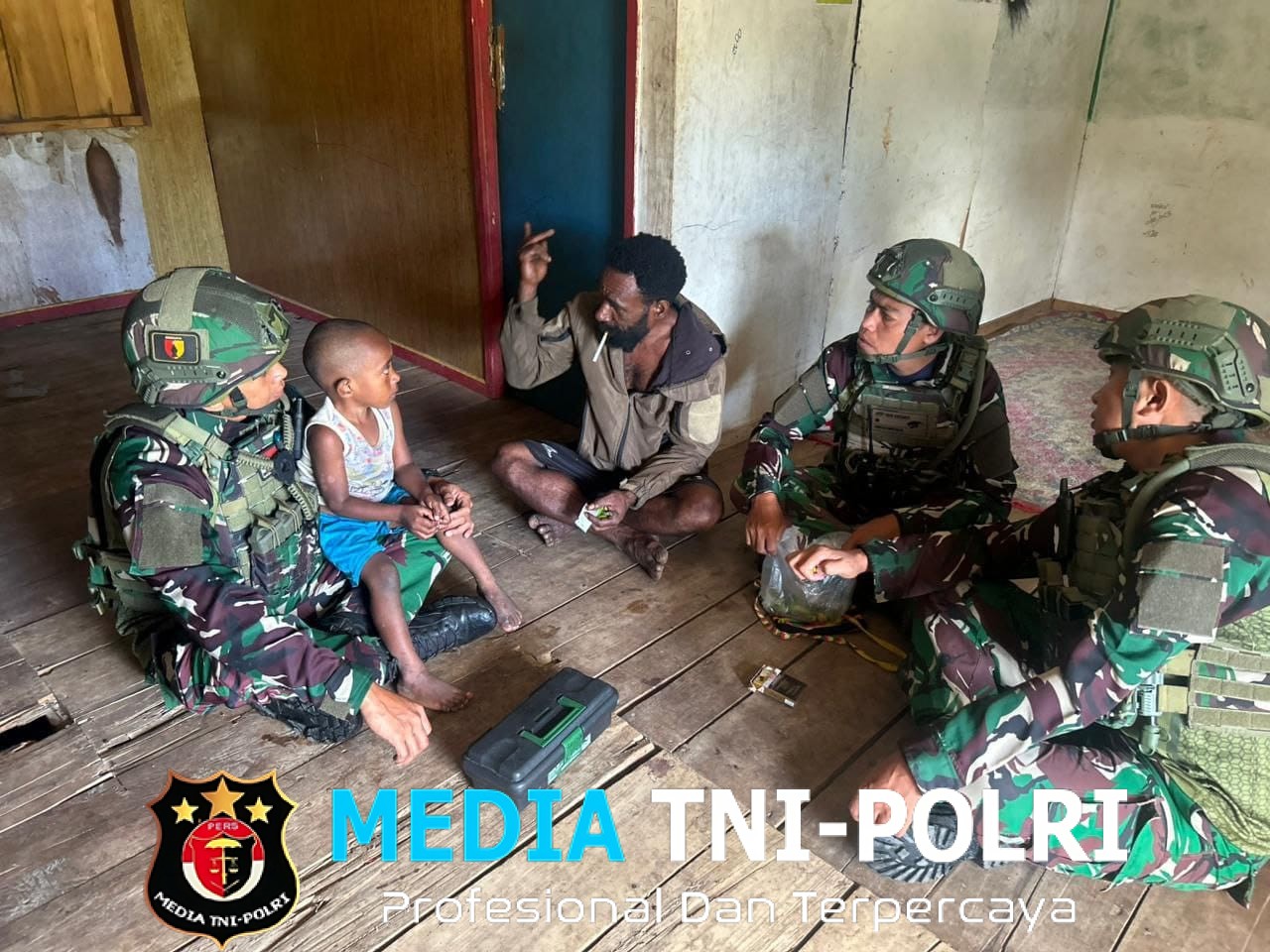 Satgas Yonif 521/DY Manunggal Dengan Rakyat di Distrik Apalapsili