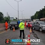 Sat Lantas Polres Pelabuhan Belawan Terapkan Contra Flow Akibat Banjir 1 Meter di Ruas Tol Arah Belawan
