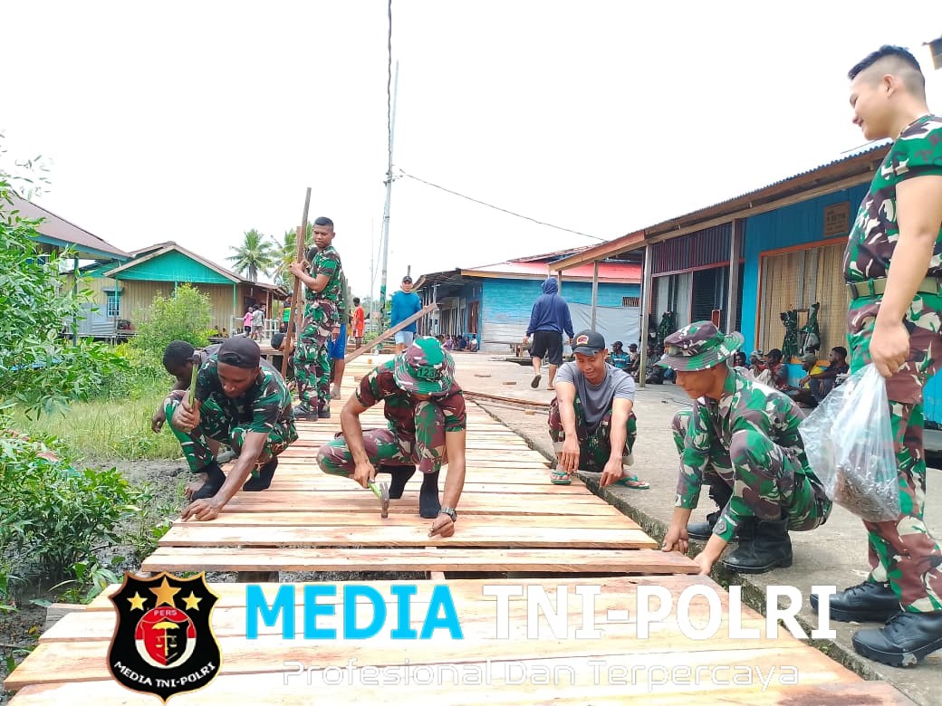 Hari Juang Kartika Satgas Yonif 123/Rajawali Bangun Pasar Baru Bagi Pedagang Kampung Ayis Fayit  ‎