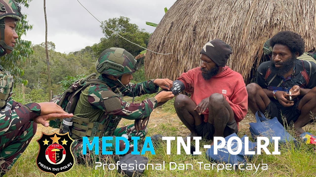 Binter Peduli Kasih Satgas Yonif 521/DY Memperkuat Hubungan Harmonis di Distrik Napua