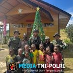 Pos Serambakon Satgas Yonif 751/VJS Dirikan Pohon Natal di Gereja Wanbakon Sambut Perayaan Natal