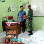 Babinsa Koramil Cepogo Dukung Gerakan GEMAR, Ayah Turun Langsung Ambil Rapor Anak