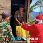 Pos Bulangkop Satgas Yonif 751/VJS Bagikan Bingkisan Natal di Kampung Bulangkop, Warga Sambut Penuh Sukacita