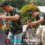 Kodim 0210/Tapanuli Utara Gelar Cukur Rambut Gratis untuk Anak Pengungsi Pascabencana