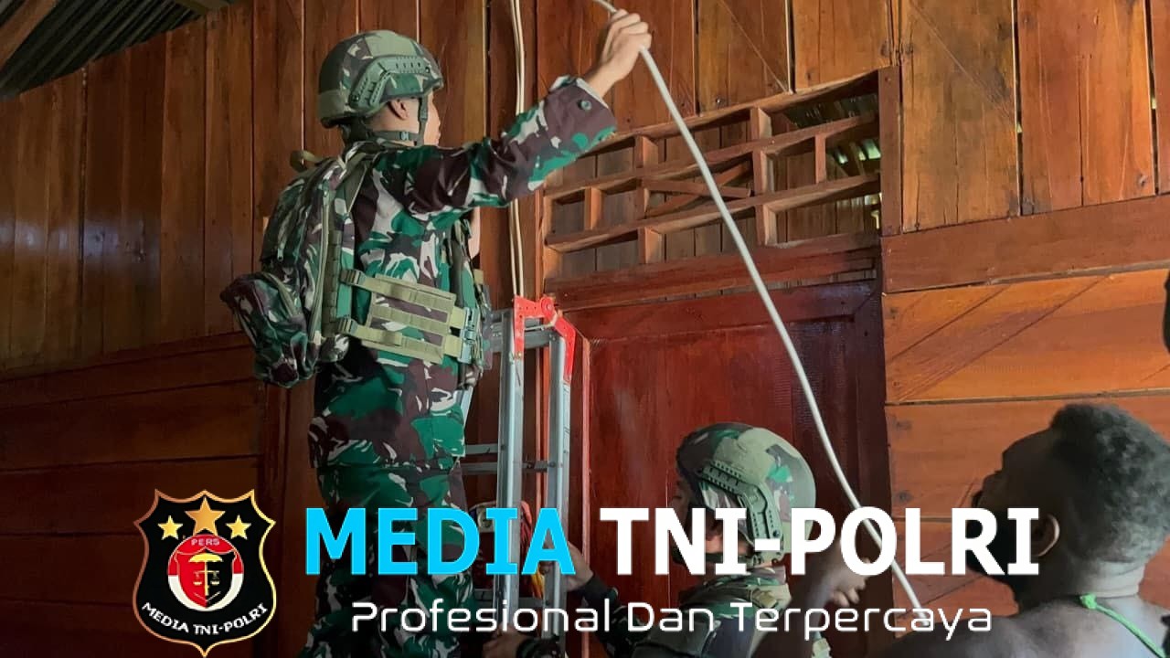 Binter Listrik Berdaya Satgas Yonif 521/DY Bantuan Teknis dan Instalasi di Papua