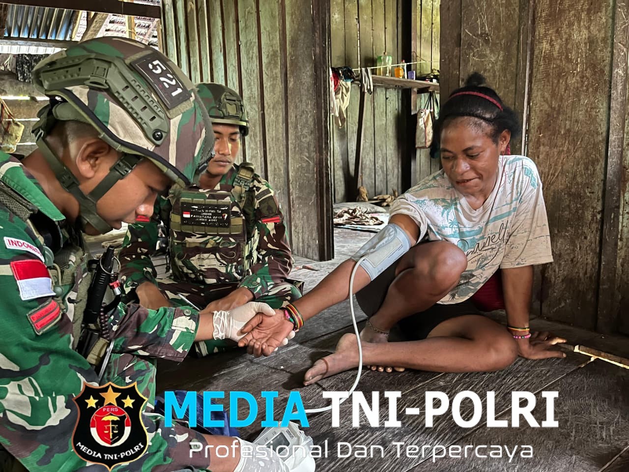 Bakti Kesehatan Satgas Yonif 521/DY Berikan Pelayanan Gratis Menjangkau Warga Papua di Daerah Terisolir