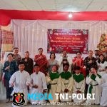 Kanit Binmas Polsek Kuala Behe Hadiri Kegiatan Natal Bersama di SMPN 1 Kuala Behe, Wujudkan Sinergi Sekolah dan Masyarakat