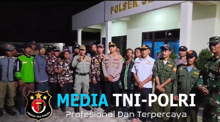 Hadirkan Rasa Aman, Polsek Setu Gelar Apel Malam Bersama Linmas dan Ojol