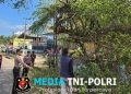 Respon Laporan 110, Polres Lampung Utara Gerak Cepat Tangani Pohon Rawan Tumbang di Depan Pasar Candimas